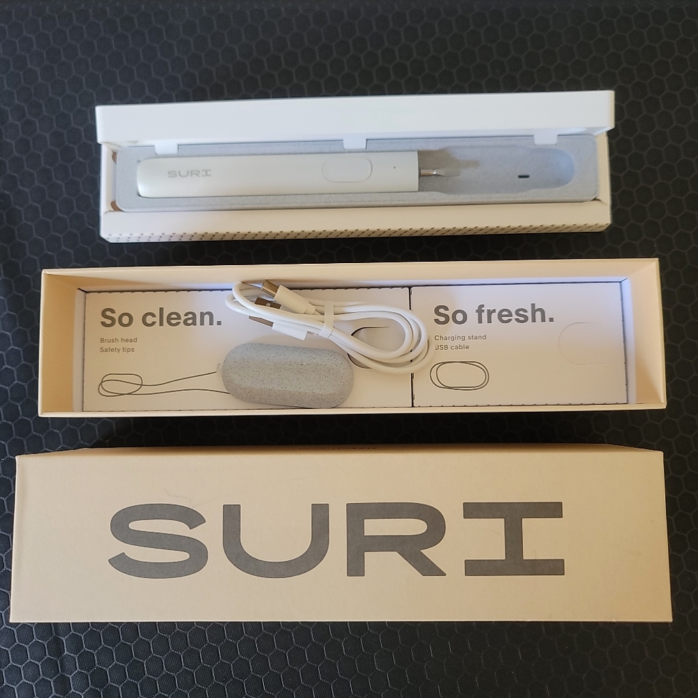 NEW SURI Sustainable Electric Toothbrush with UV Case